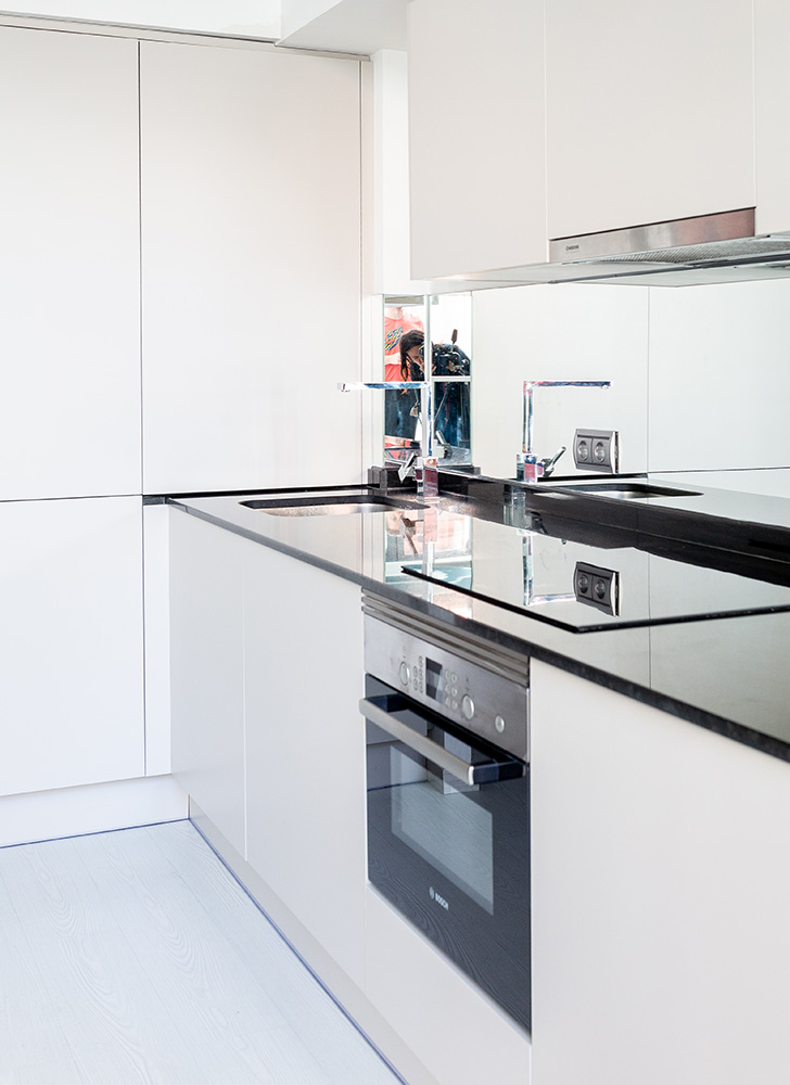 cocina gama alta integrada en salon en madrid